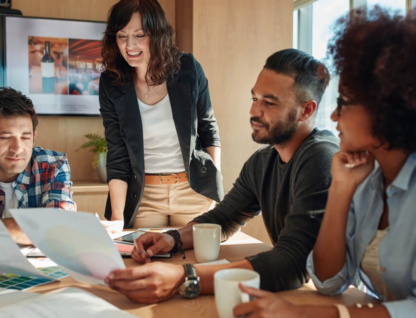 Group,Of,Young,Business,People,And,Designer,Looking,At,Color Group,Of,Young,Business,People,And,Designer,Looking,At,Color